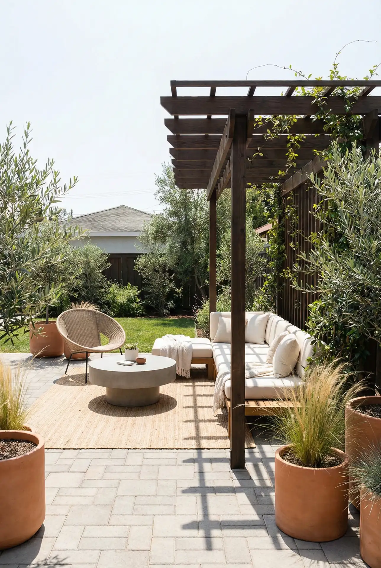 Backyard Paver Lounge With A Pergola Shade Strip 1