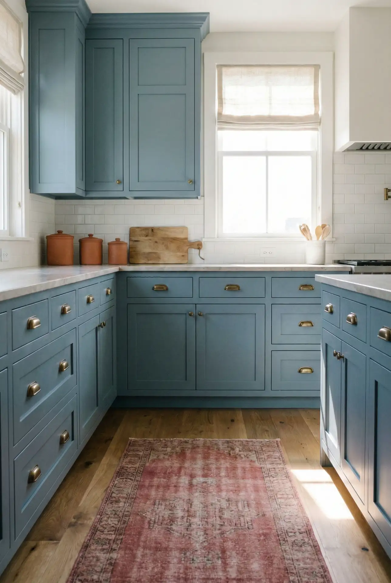 Dusty Blue Cabinets With Red And Brass Hardware Pop 1