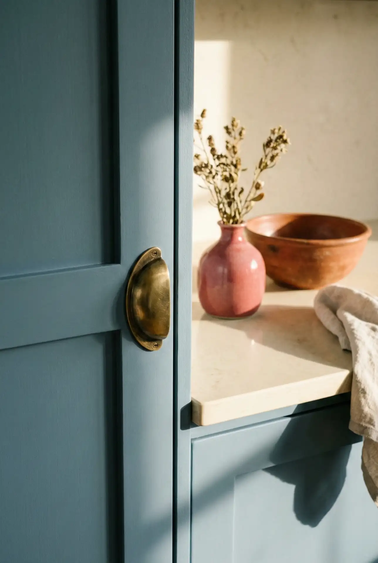 Dusty Blue Cabinets With Red And Brass Hardware Pop 2