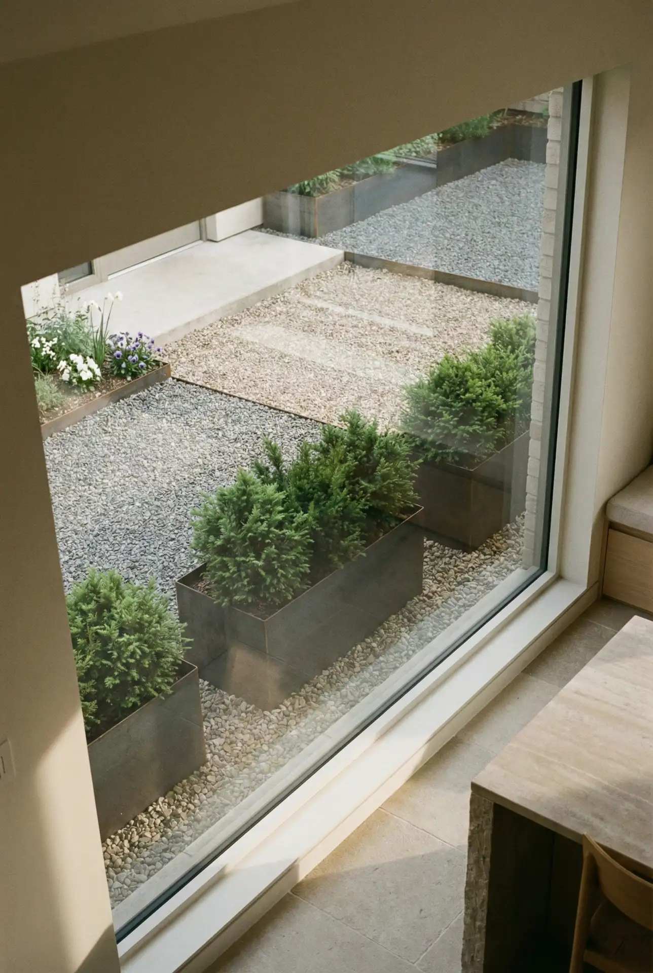 Low Maintenance Front Yard With Gravel And Evergreen Structure 2