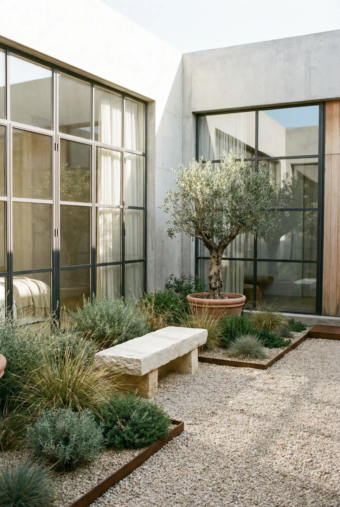 Modern Gravel Lounge With Layered Planting 1