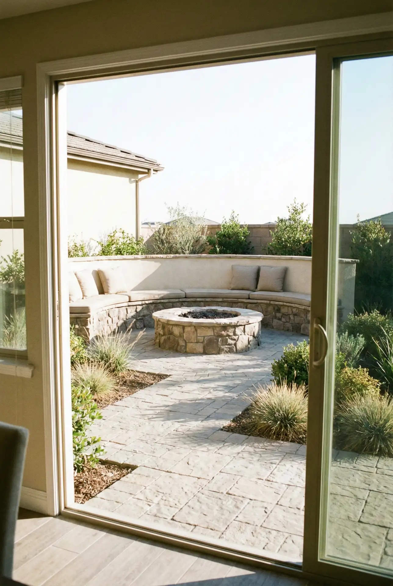 Simple Stone Patio With Built-In Firepit Ideas 1