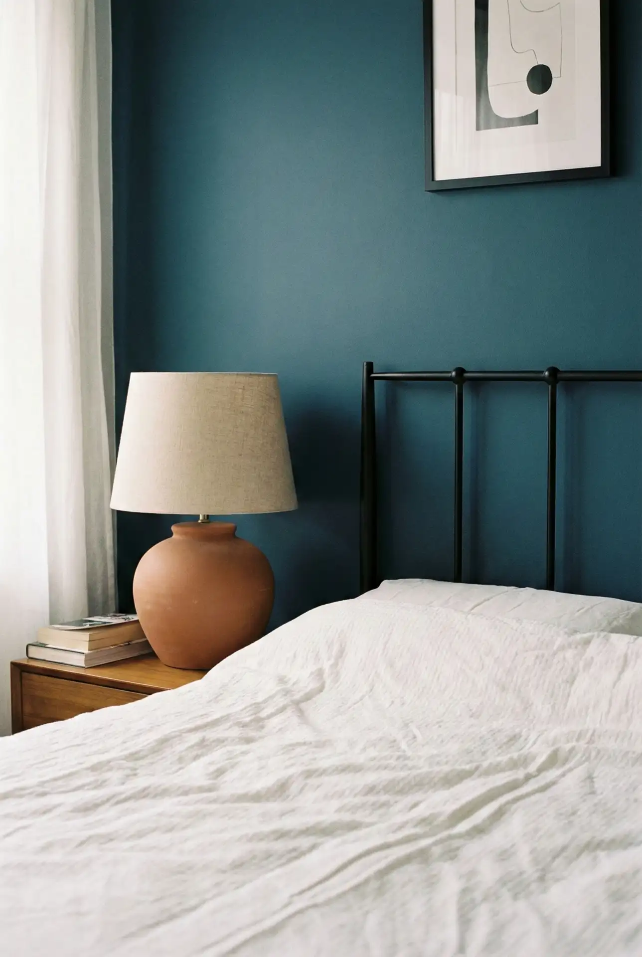 Teal Statement With Terracotta Touches And A Black Headboard 2