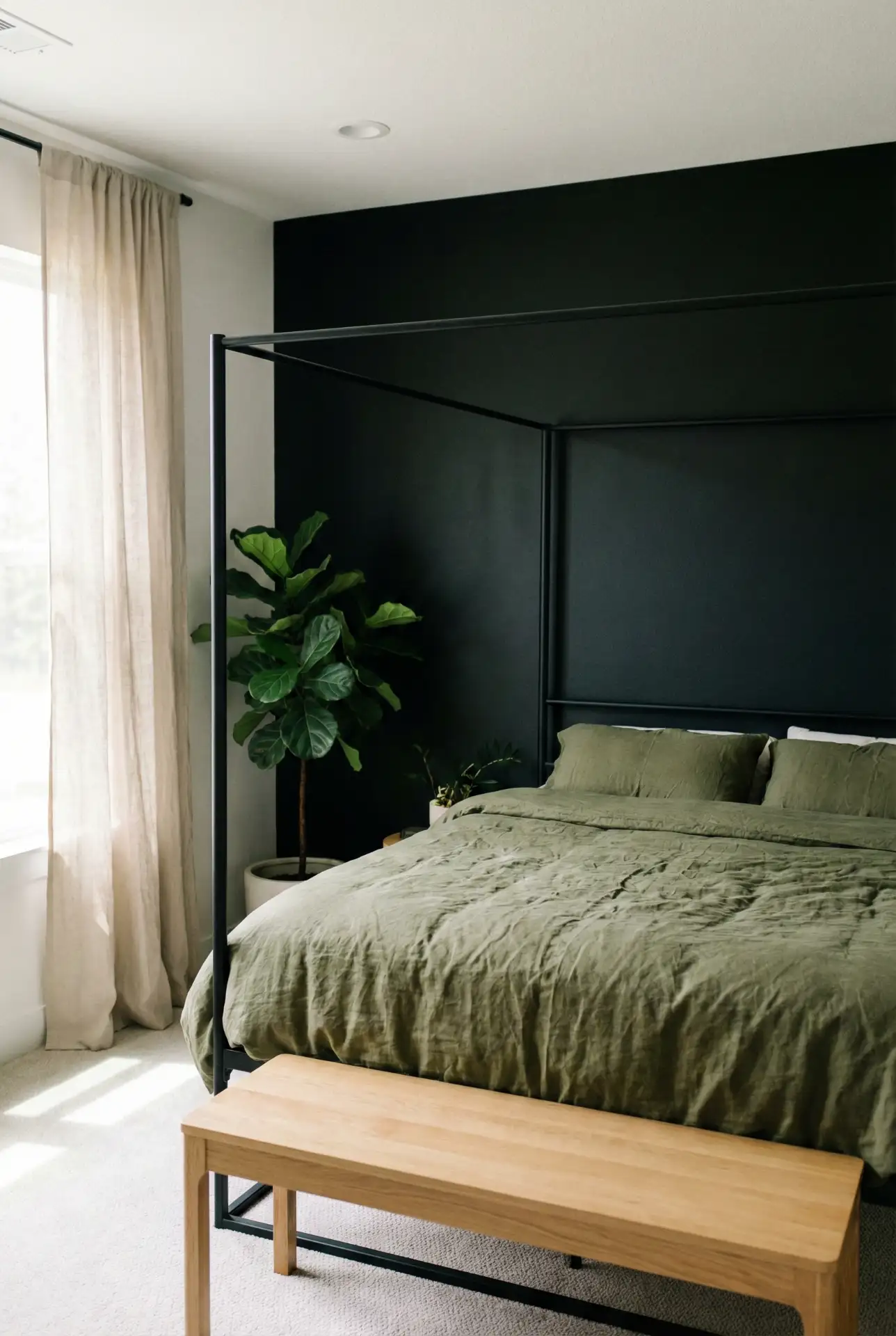 Black Accent Wall With Green Bedding And A Canopy Bed 1