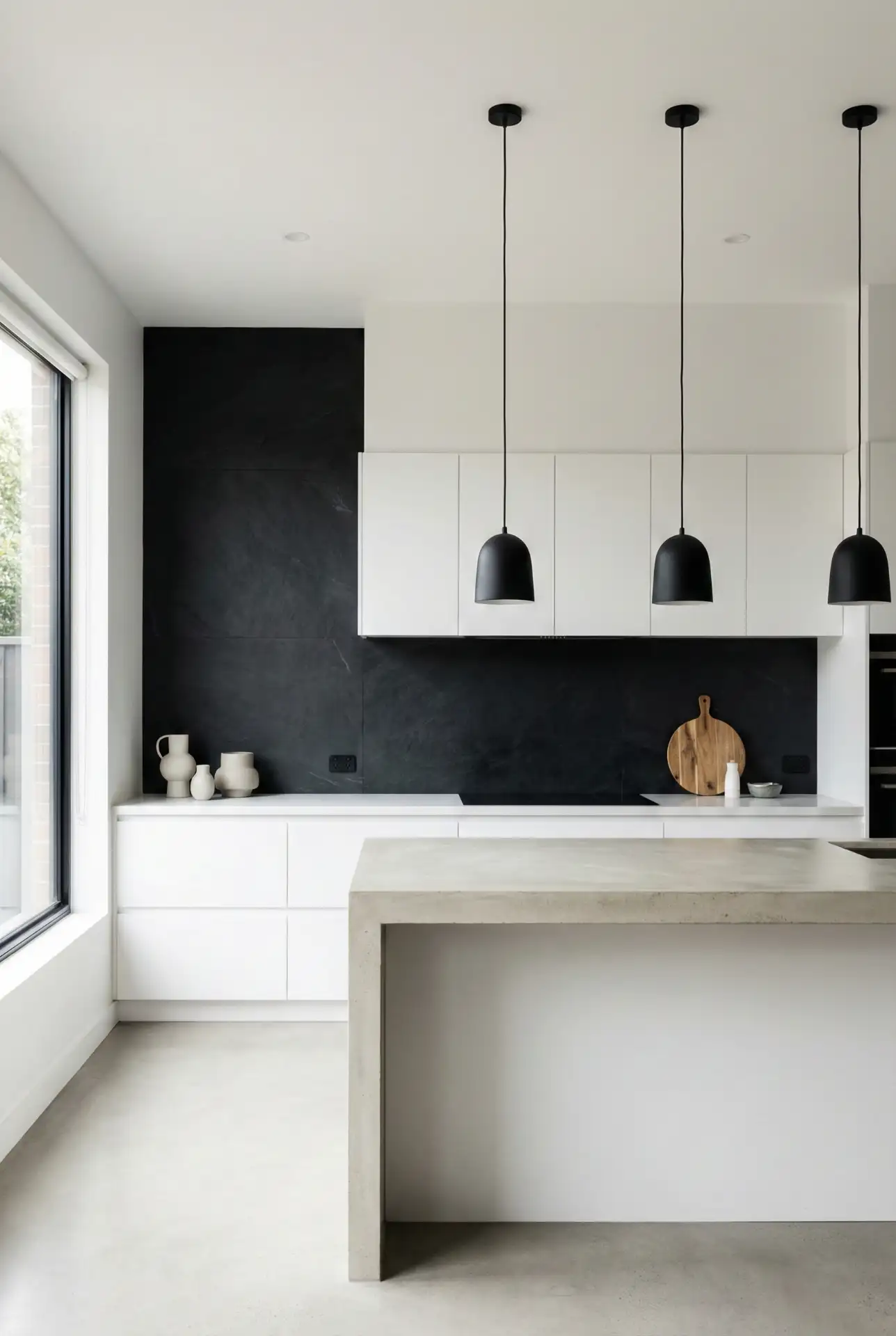 Black Backsplash With Crisp White Cabinets And A Statement Island 1