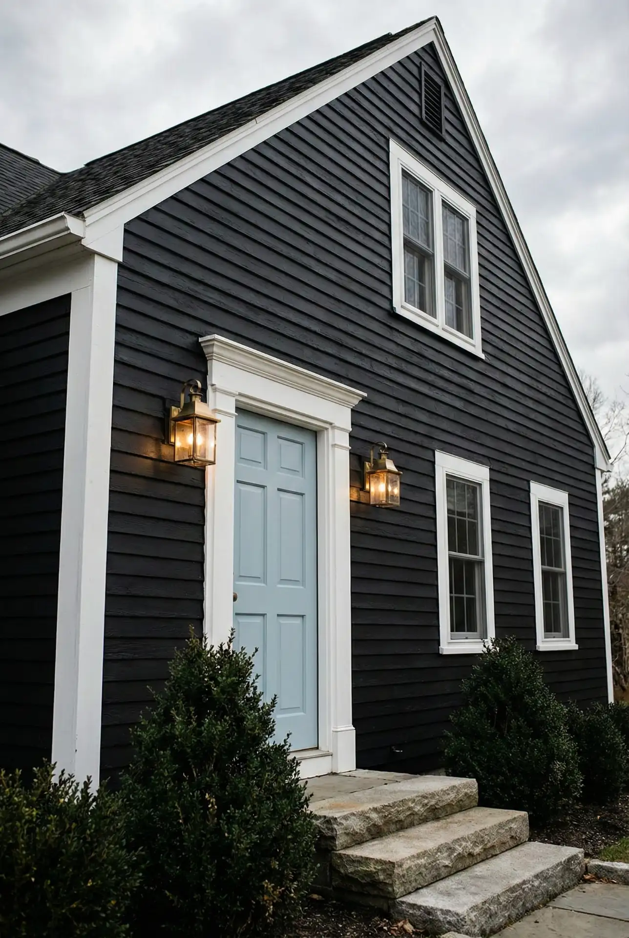 Black Exterior With Light Blue Door Accent 1