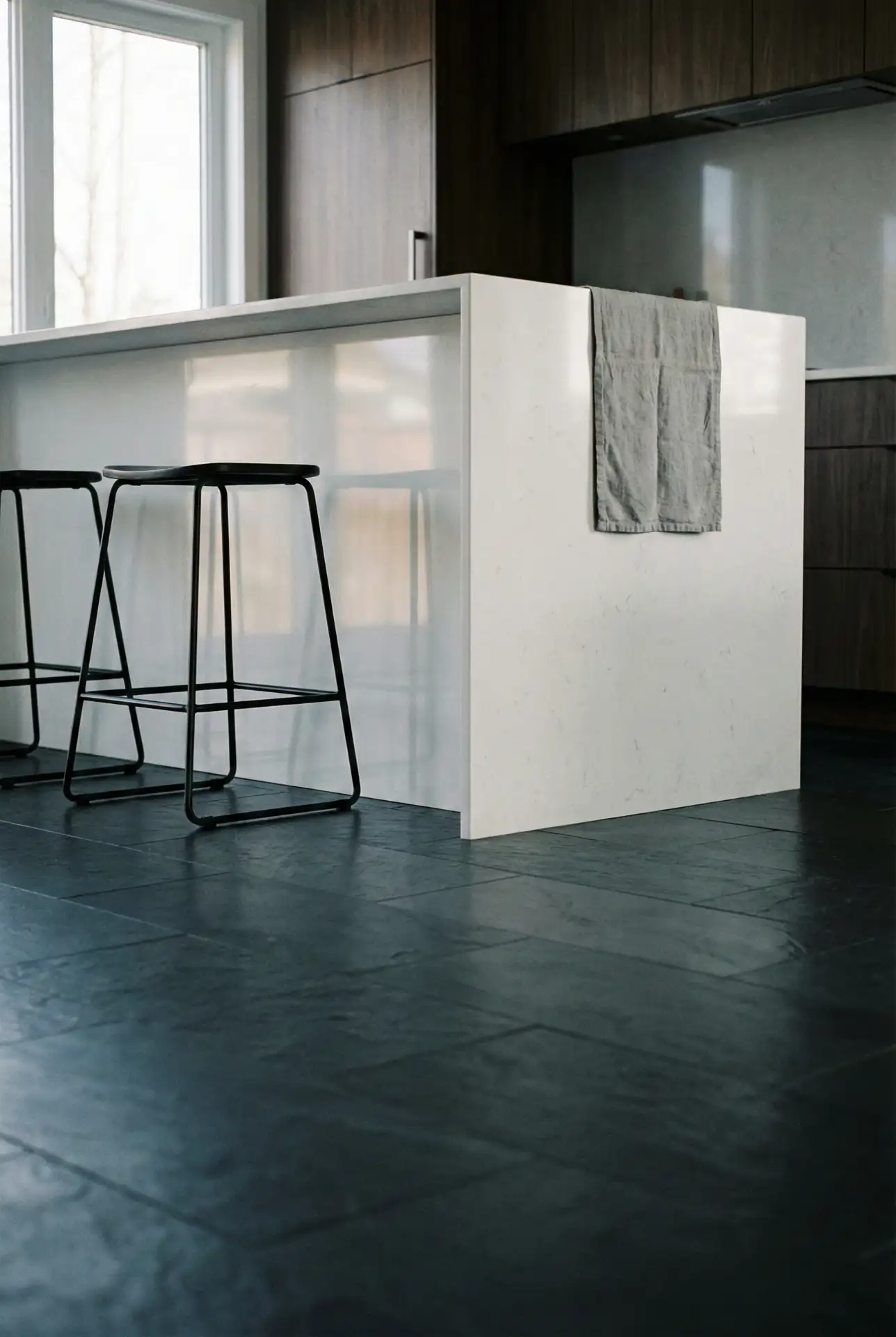 Black Island With White Waterfall Countertops 2