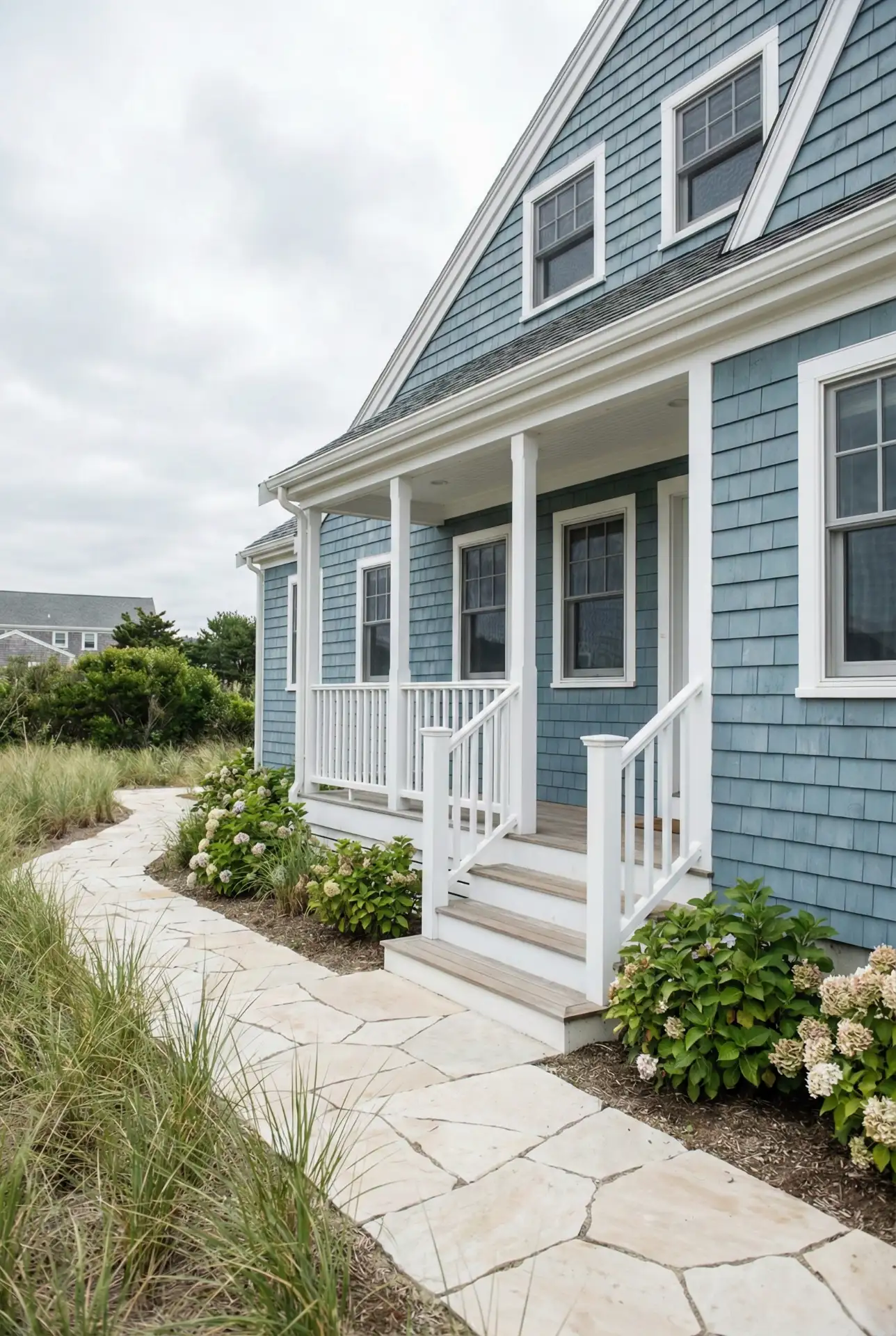 Coastal Blue And White With Breezy Porch Rails 1
