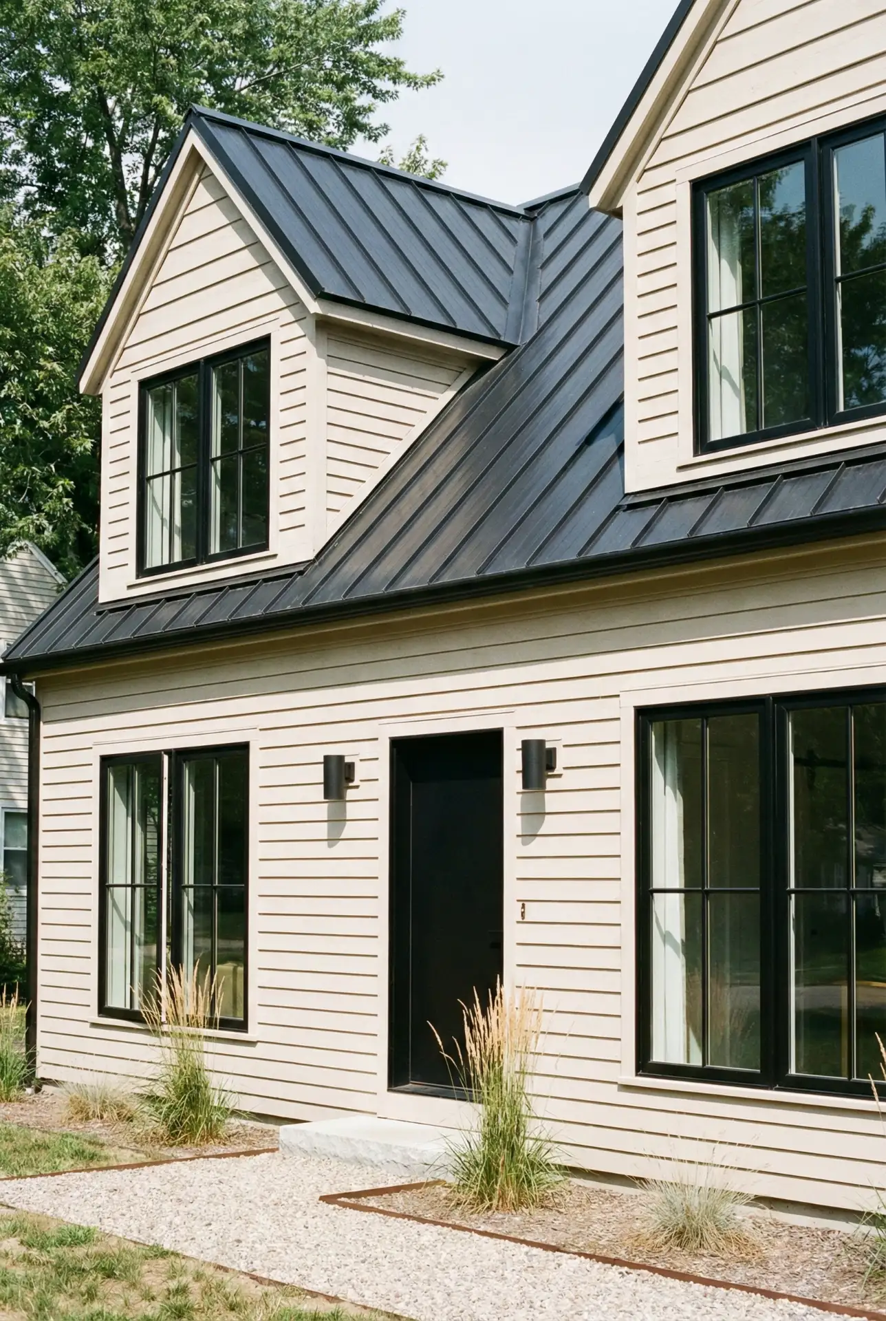 Contemporary Grey With Black Windows And Minimal Landscaping 1