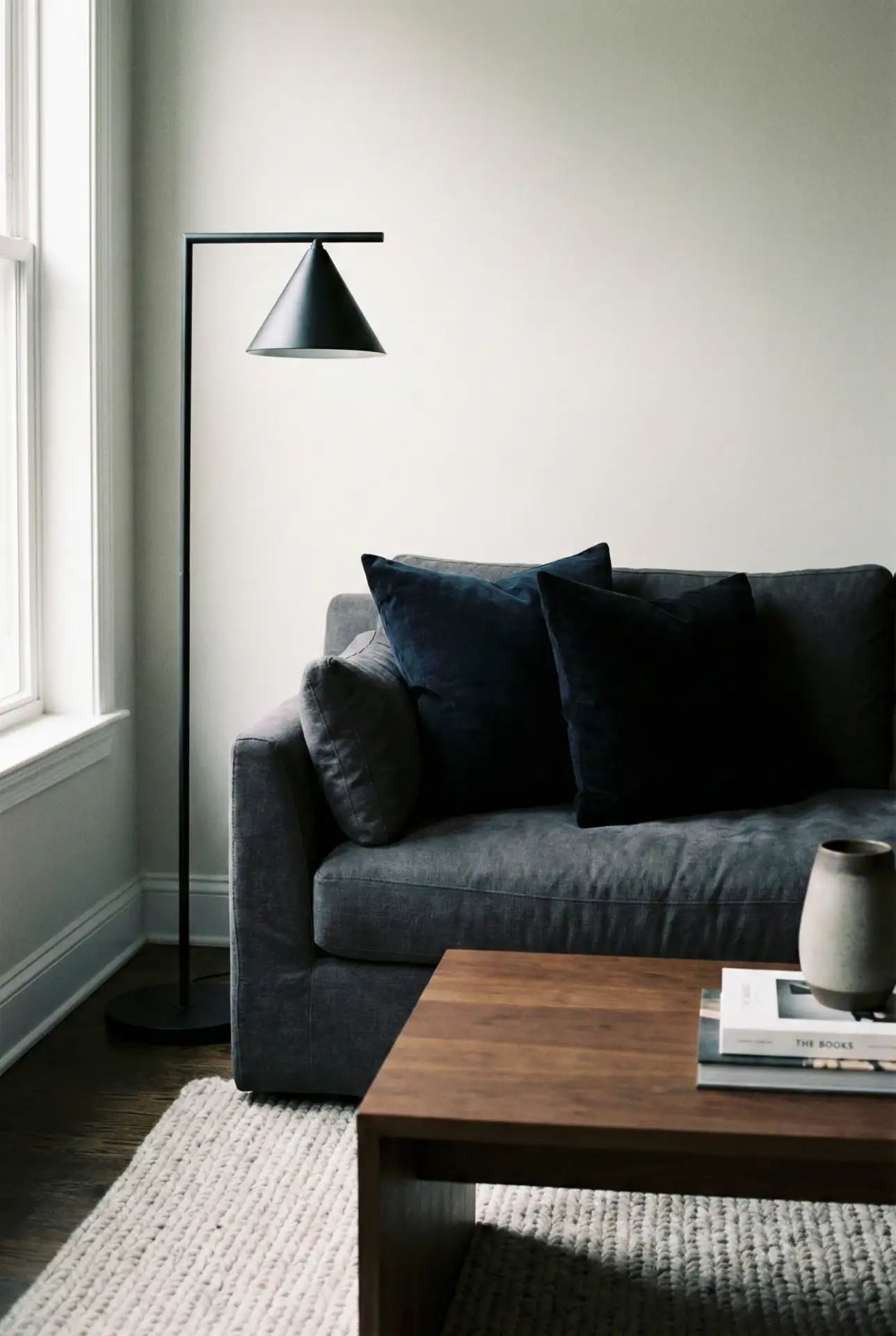 Grey Sofa With Dark Accents For A Modern Moody Apartment 2
