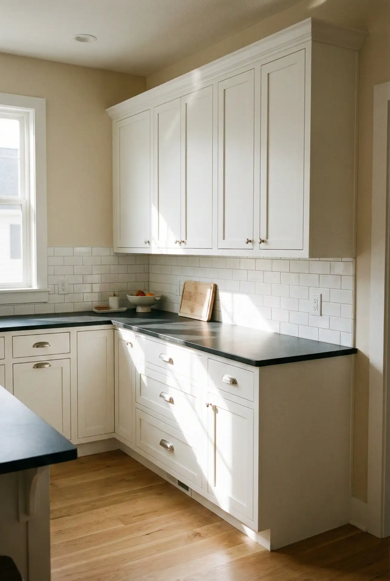 High-Contrast Black Counter Top With Soft Neutral Walls 1