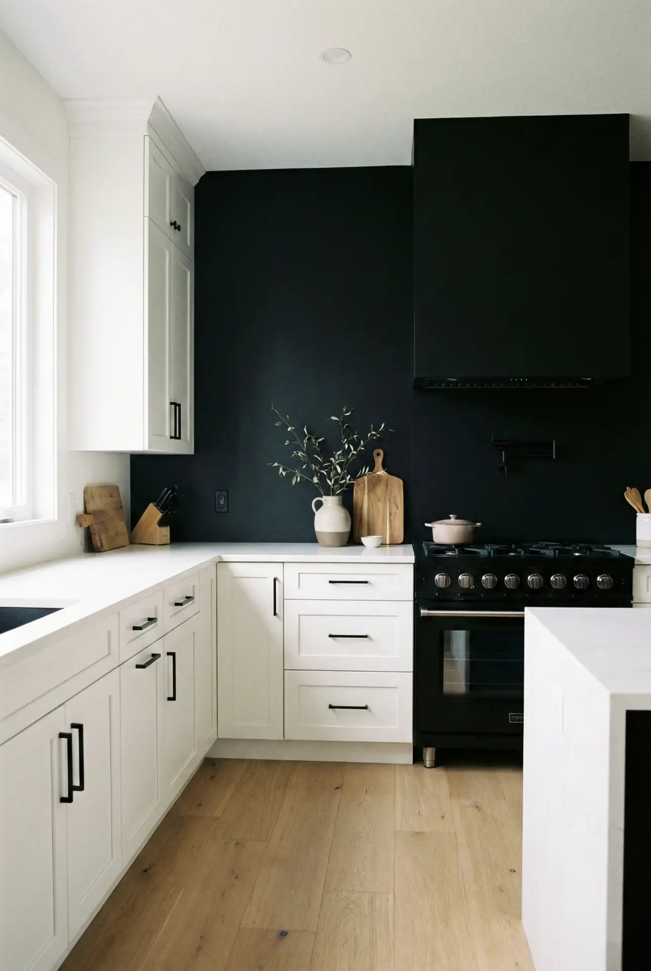 White Kitchen With Black Floor And Subtle Grey Accents 1