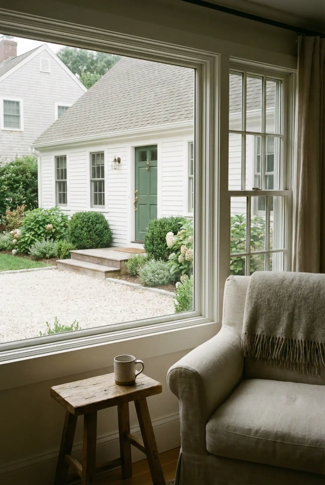 White Siding With Green Door And Garden Trim 1