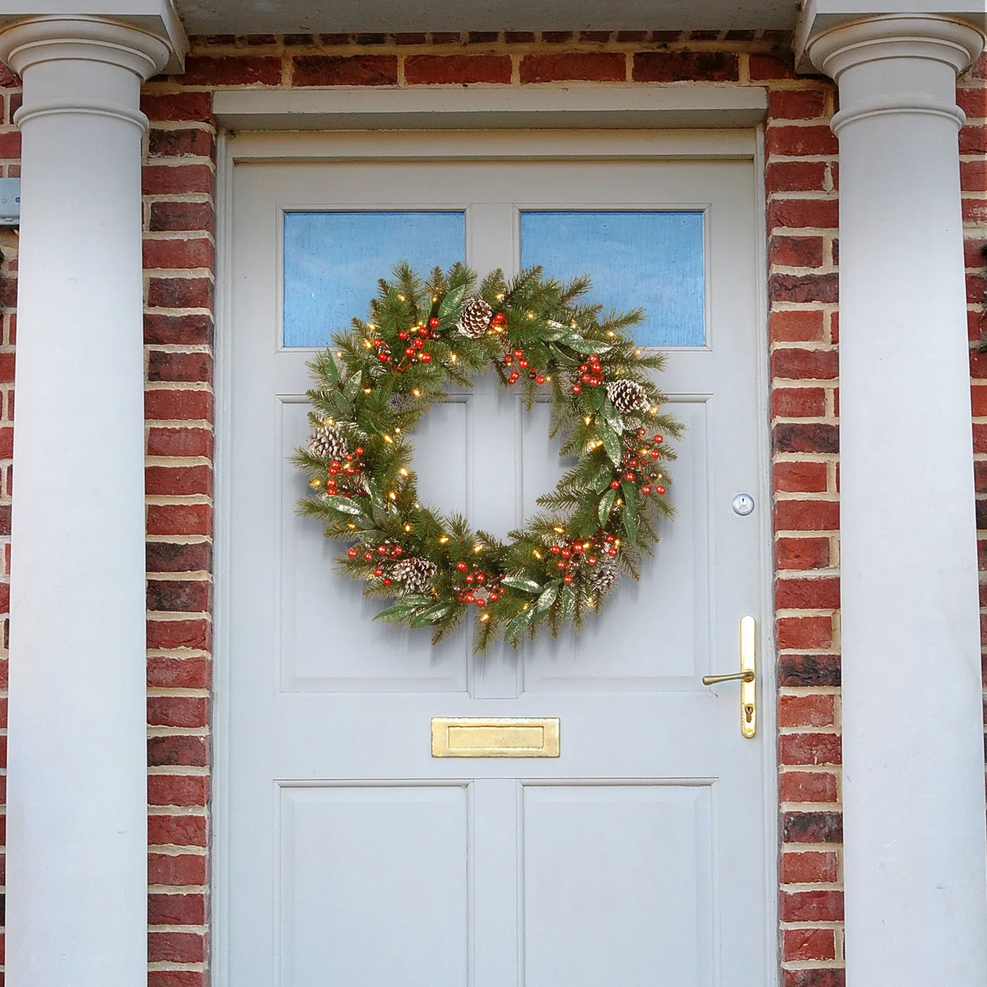 24 in. Pre-Lit Frosted Pine Berry Wreath with LED Lights · National Tree  Company