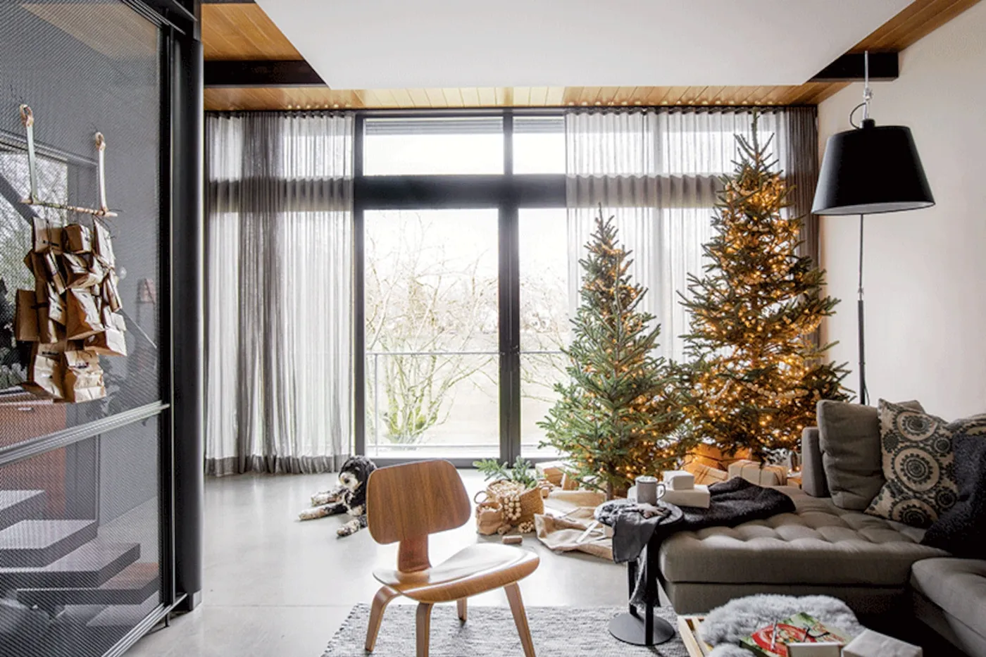 A Scandi-chic home made festive with twinkling lights and lots of greenery  | Style at Home