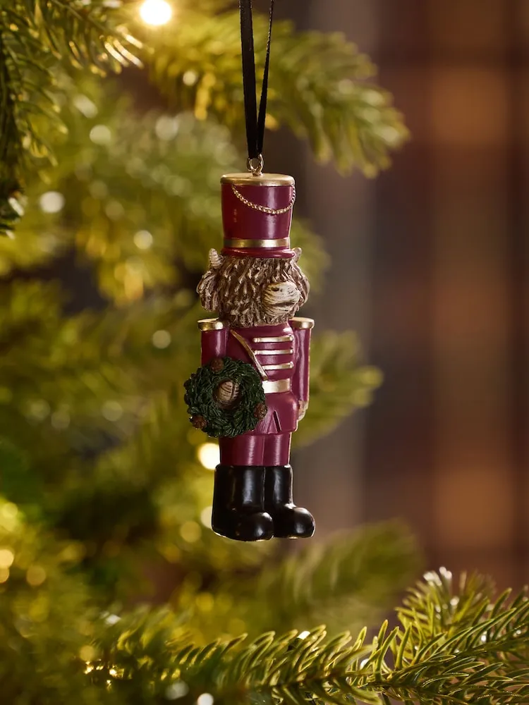 Buy Burgundy Red Hamish Nutcracker Christmas Bauble from Next USA