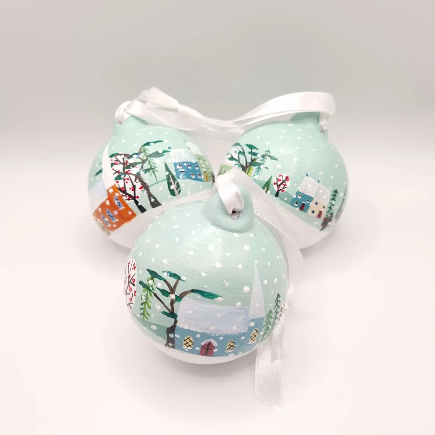 Hand painted baubles - snowy village scene - Kerry Shearer Art