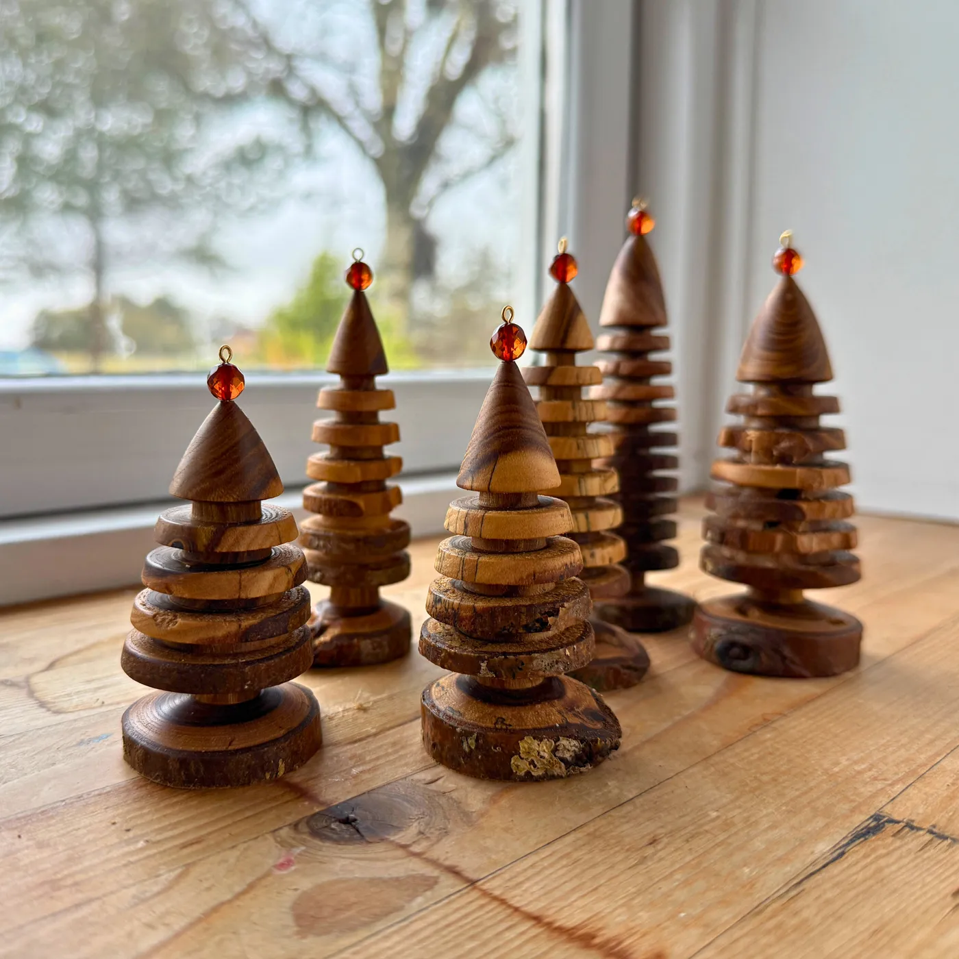 Hand-turned Laburnum Christmas Tree topped with an Amber bead | Ravgaard 106mm