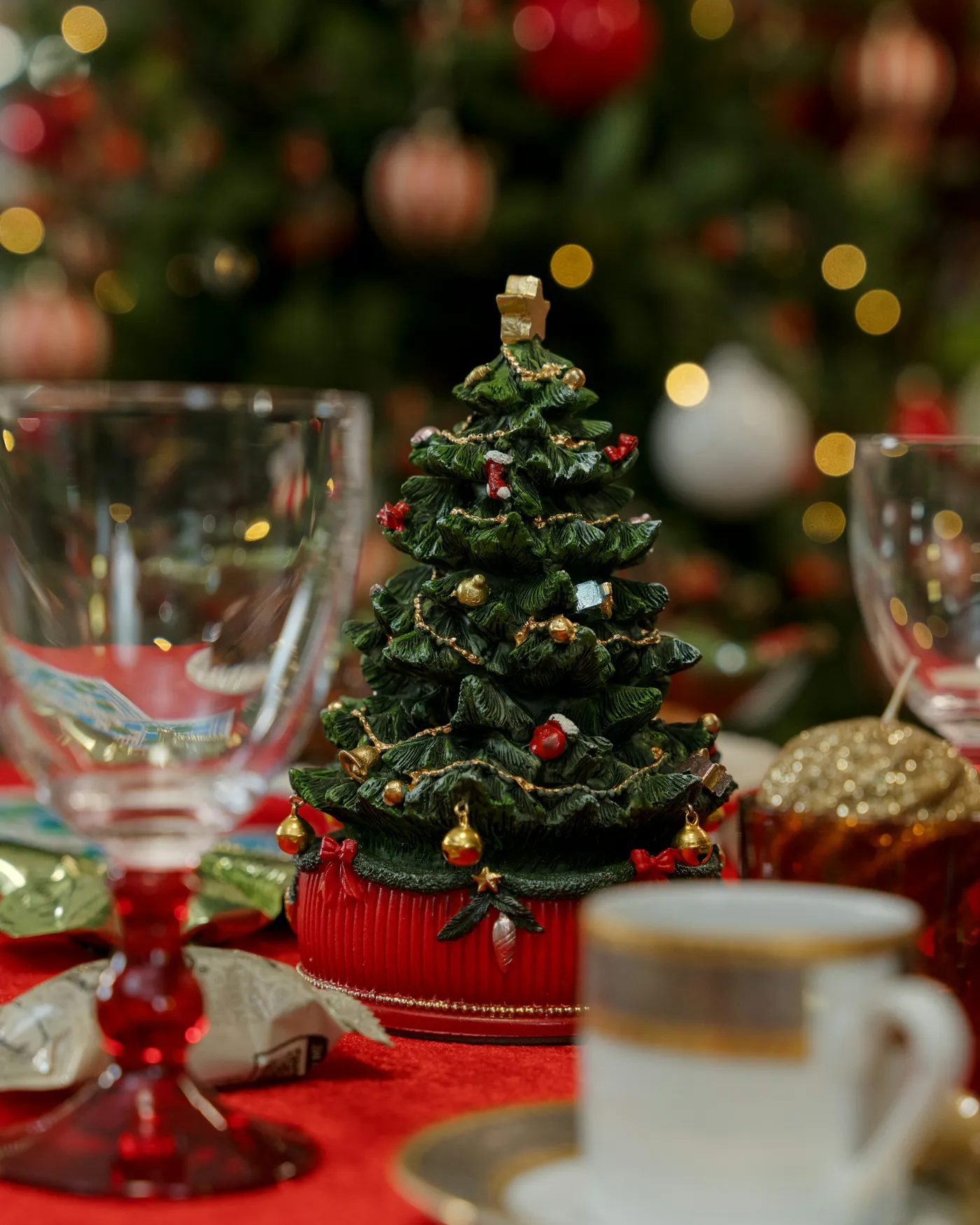 Miniature christmas tree centerpiece on a festive table - Free Photo on Unsplash