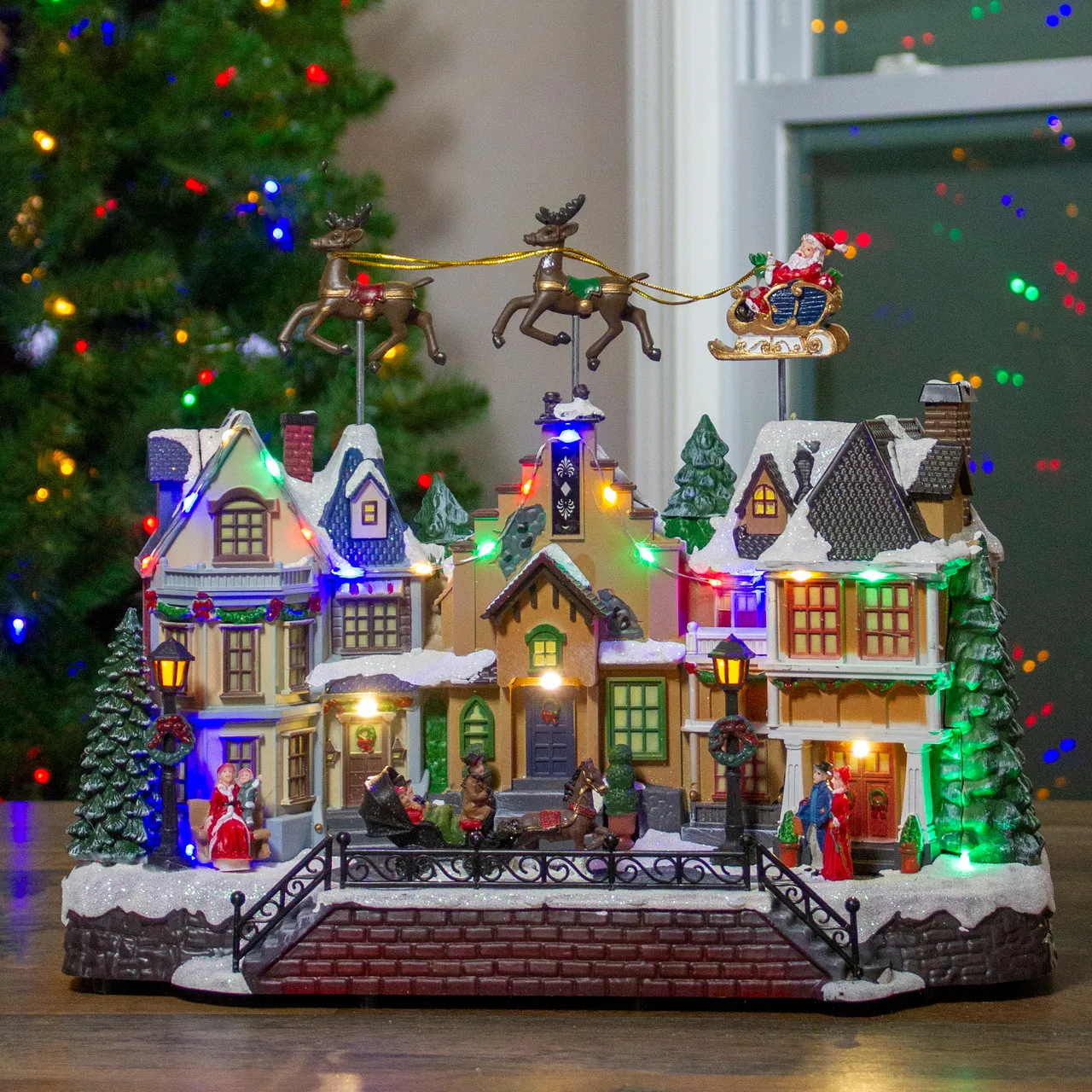 Musical Holiday Village Scene by Gerson Companies – Traditions Christmas Village House Large Colorful LED Lights Animated