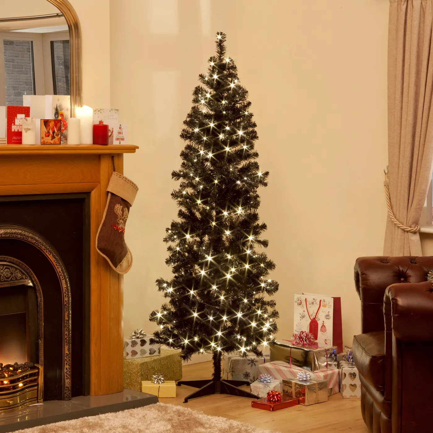 Pre-Lit Deluxe Black Christmas Tree with Warm White LEDs – Christmas Trees  and Lights