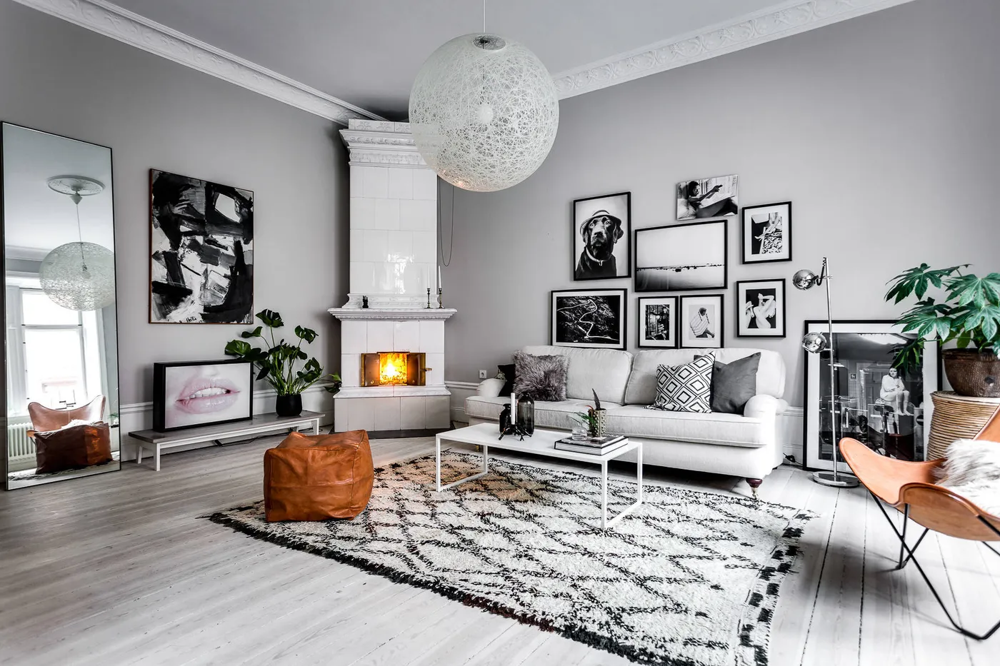 Scandinavian Hygge Cozy Scandinavian Living Room With Beige Knit Throw,  Candles, And Fireplace: Hygge Home Interior