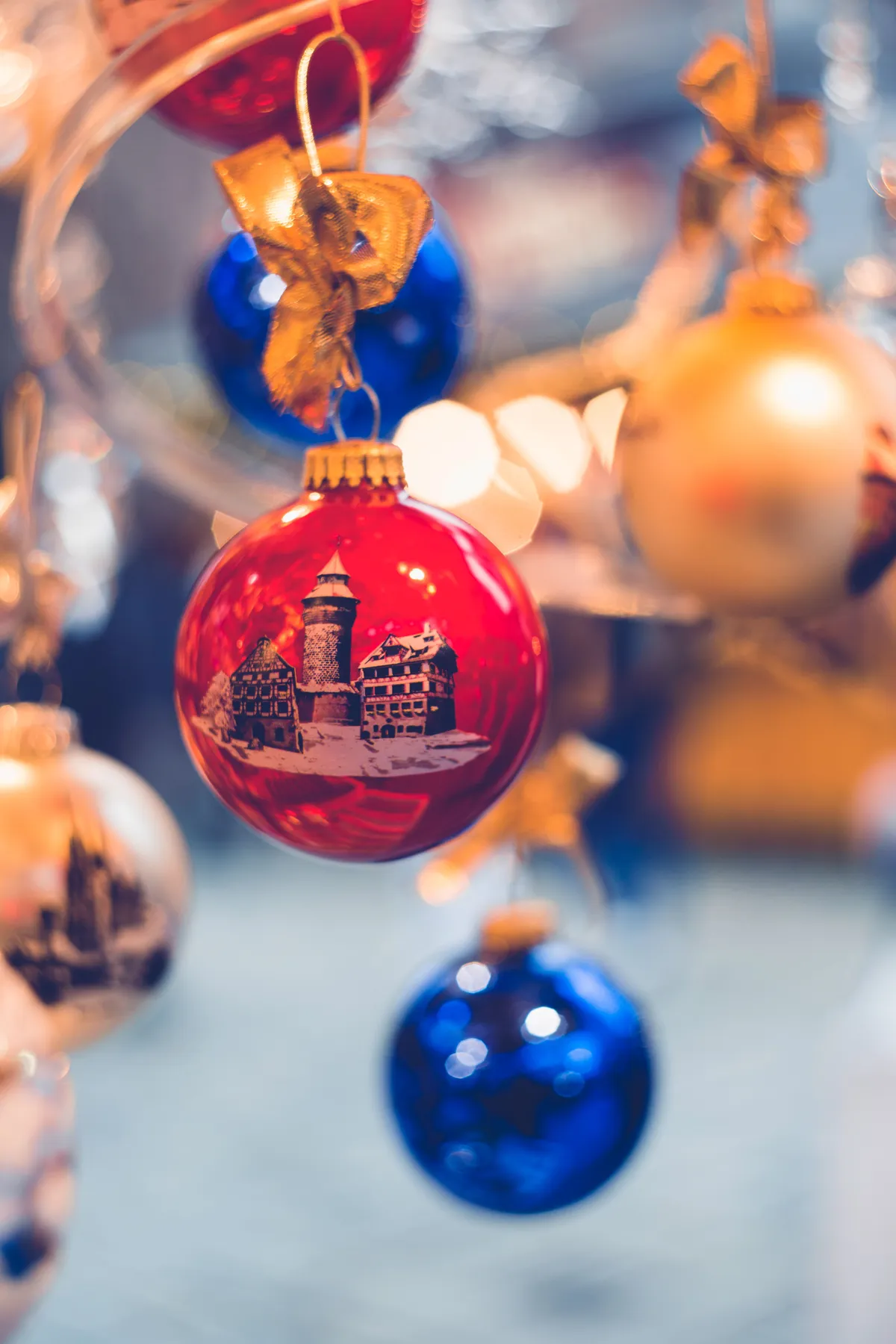 Vibrant Christmas ornaments with intricate designs, perfect for holiday decor.