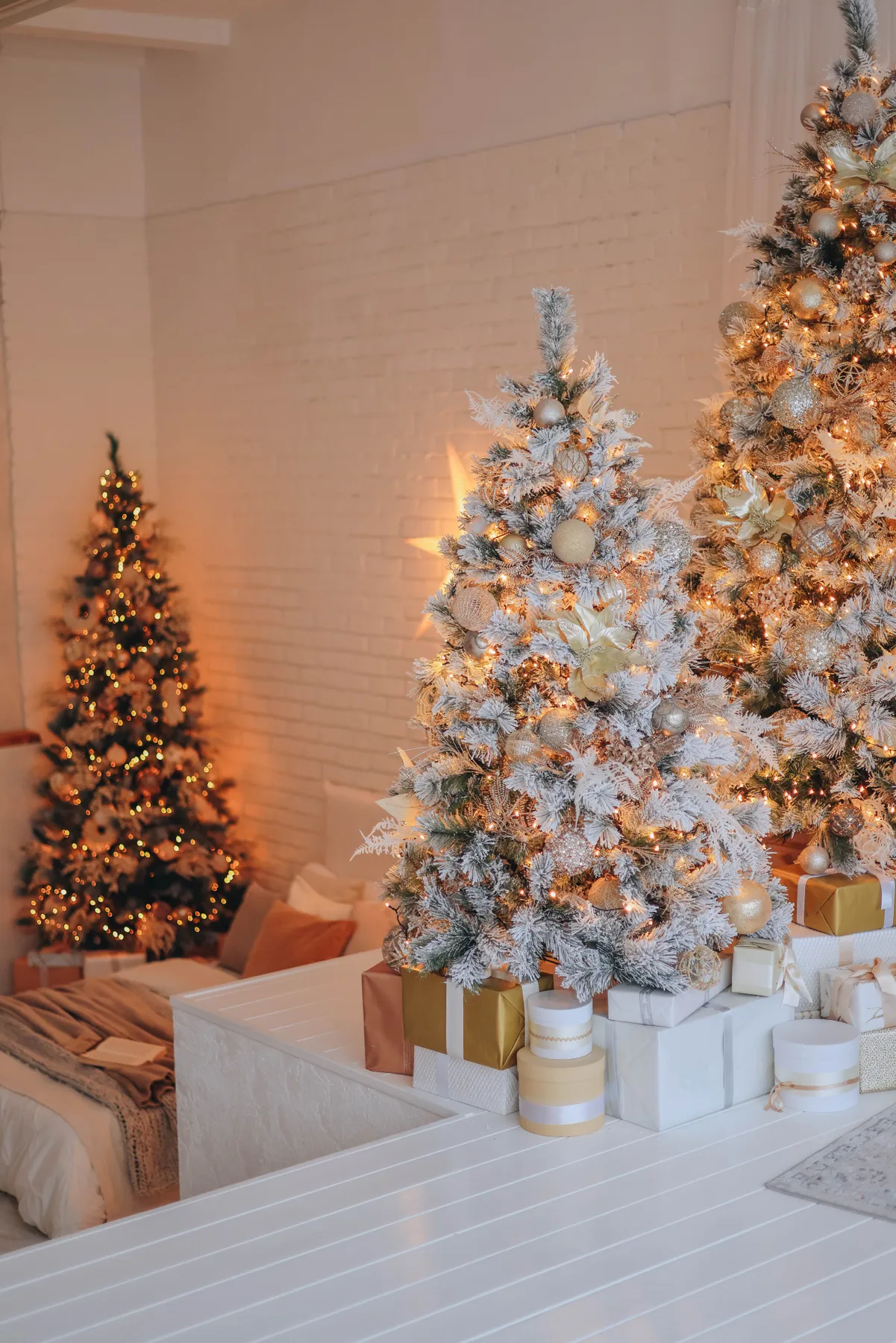 Warm festive room with two decorated Christmas trees, glowing lights, and gift boxes. Perfect holiday ambiance.