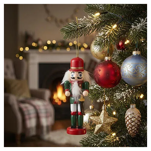 Wooden Christmas nutcracker tree ornament with green and red saber | online sales on HOLYART.co.uk